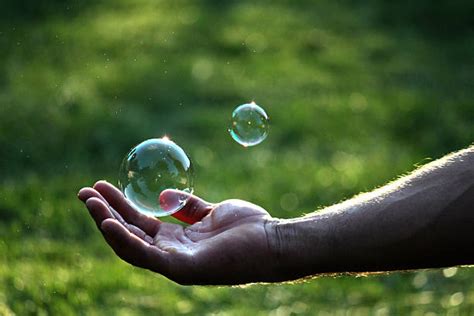 Best Catching Bubbles Stock Photos Pictures And Royalty Free Images Istock
