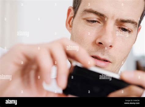 A Man Using A Smart Phone Stock Photo Alamy