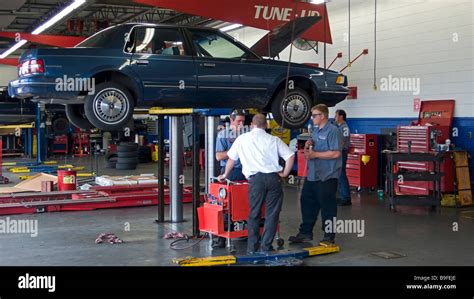 Motor Car On Hydraulic Lift Repair Workshop Springfield Missouri Usa