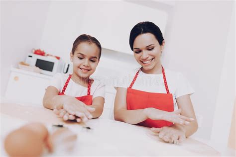 Mom Teaches Daughter How To Cook Girl With Mom Stock Image Image Of Flour Daughter