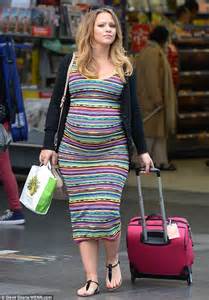 Kimberley Walsh Pats Baby Bump In Flower Print Before Changing Into