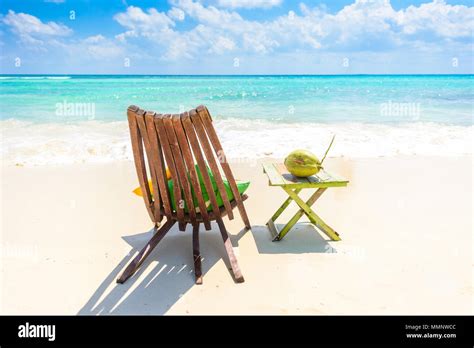 Playa Del Carmen Relaxing On Chair At Paradise Beach And City At Caribbean Coast Of Quintana