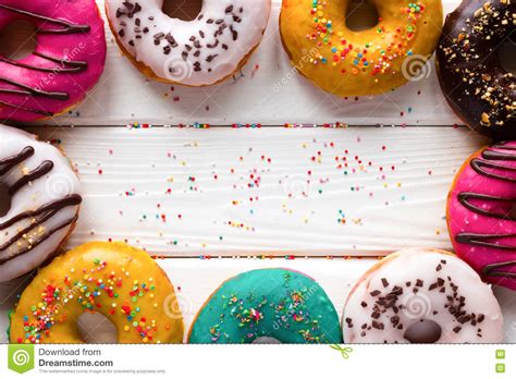 16538 Donuts Wooden Background Stock Photos Free And Royalty Free