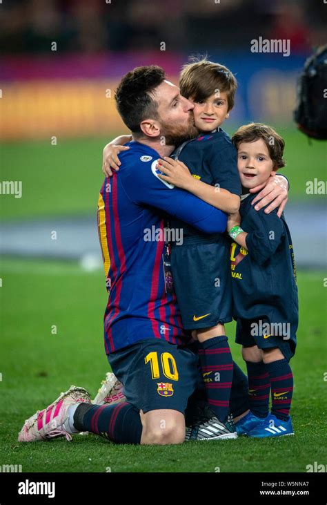lionel messi of fc barcelona kisses his son thiago to celebrate after his team defeated levante