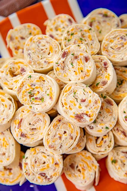 Cream cheese, cheddar, bacon, ranch and chicken wrapped in a tortilla. Crack Chicken Pinwheels - Football Friday | Plain Chicken®