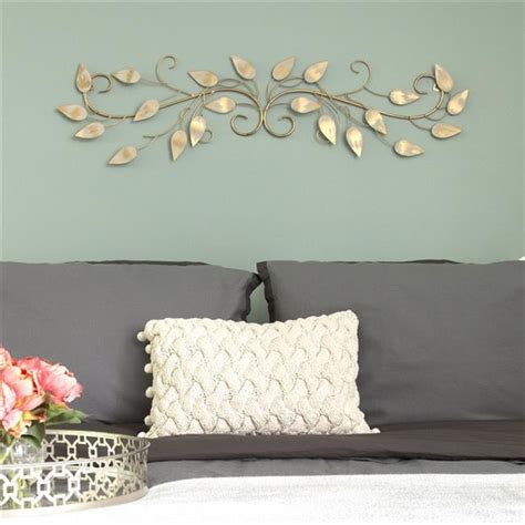 Stratton Home Decor S09607 Brushed Gold Over The Door Scroll Wall Decor