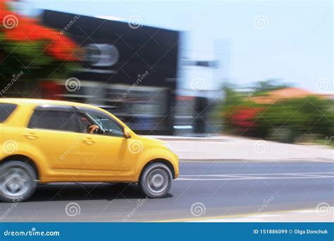 Moving Yellow Car On The Street Stock Image Image Of Road Trip