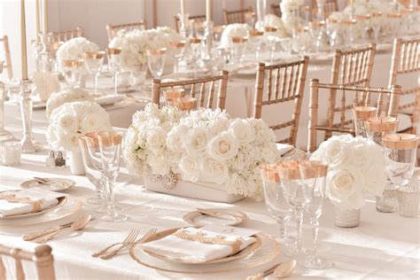 Elegant Ivory Wedding Centerpieces With Rose Gold Table