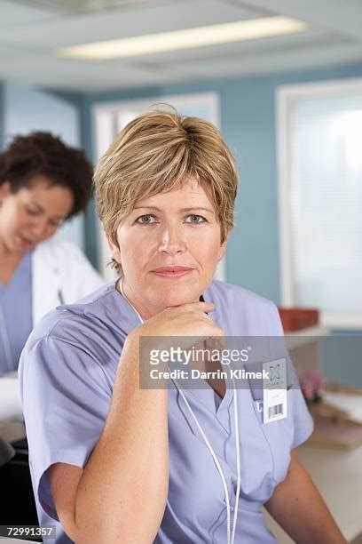 Doctor Hand On Chin Photos And Premium High Res Pictures Getty Images