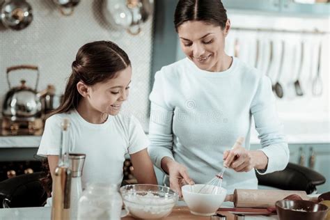 Mother And Daughter Cooking At Kitchen Stock Image Image Of Chair Portrait 34070209