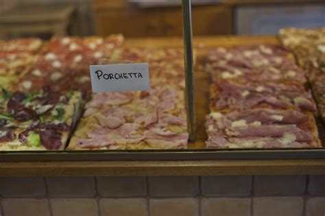 An on-to-the slice of pizza taglio in Rome is a must! | Urban Travel Blog