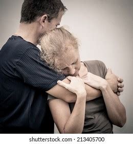 Sad Woman Hugging Her Husband Stock Photo Shutterstock