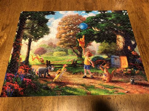A 500 Piece Thomas Kinkade Winnie The Pooh Puzzle Much Easier Than The
