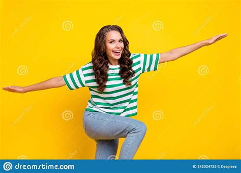 Photo Of Lovely Brunette Curly Young Lady Fly Wear T Shirt Jeans
