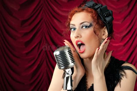 Redhead Woman Singing Into Vintage Microphone Stock Photo Image Of