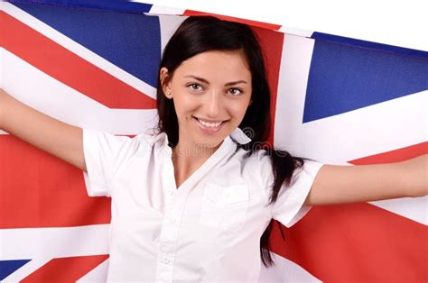 Portrait Of A Beautiful British Girl Smiling Holding Up The Uk Flag Stock Image Image Of