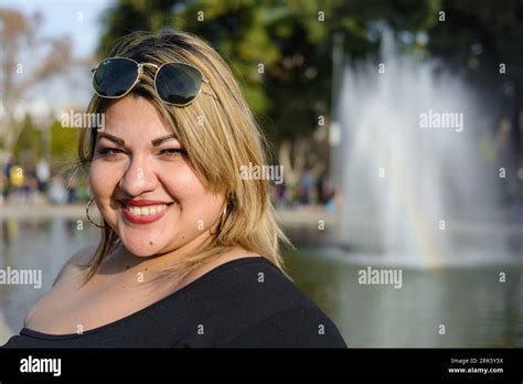 Closeup Portrait Of Young Blonde Plus Size Latina Woman Standing In