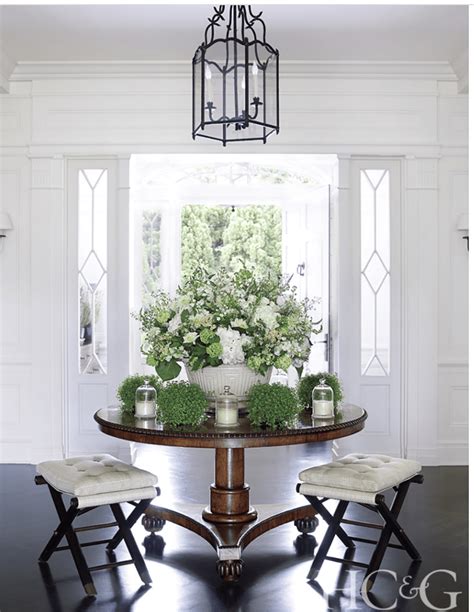 Hampton Cottages And Gardens Home With Round Entry Table On Cindy
