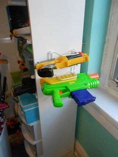 Used small boards on the backside to mount on wall and give enough here are the 11 best nerf gun ideas we could find with simple diy elements that make your nerf war extra special from a diy dart holster, spinning. Nerf gun organization on Pinterest | Nerf Gun Storage ...