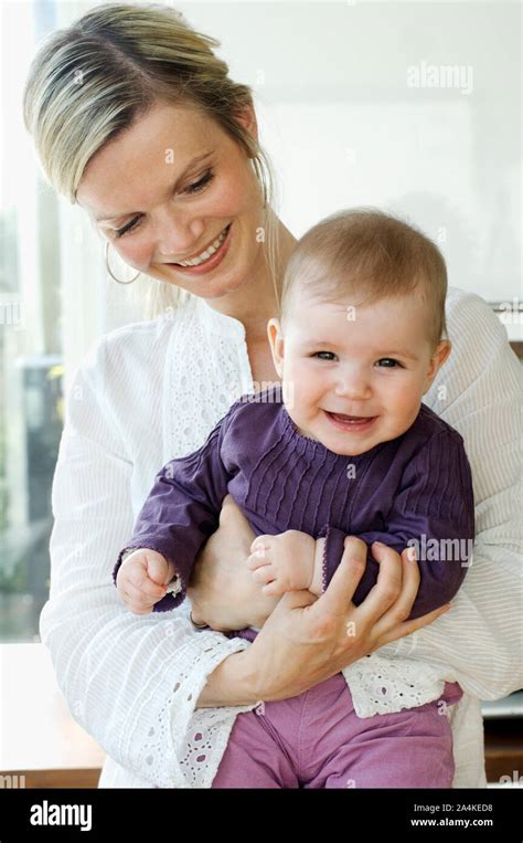 Mother And Baby At Home Stock Photo Alamy