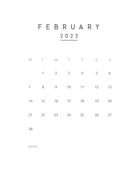 A White Calendar With The Word February On Its Front And Back Pages In