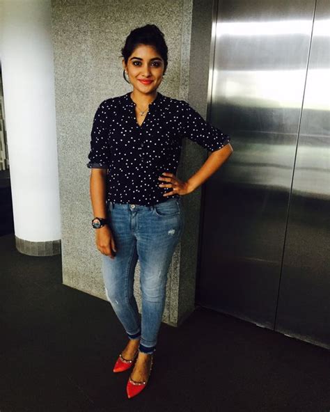 indian filmy actress niveda thomas photos in black dress fashion western wear outfits