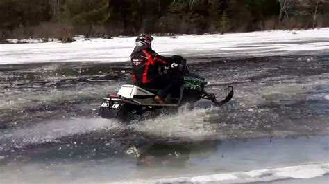 Water Skipping Snowmobiles On Mink Lake Youtube
