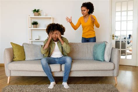 Black Couple Having Quarrel At Home Wife Shouting At Husband Stock