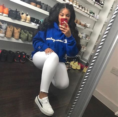 Instagram Baddie In Puma Sneakers White Jeans And A Blue Sweatshirt
