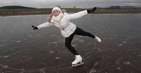 Watch Figure Skater Glide Across Frozen Water Near A55 As She Practices
