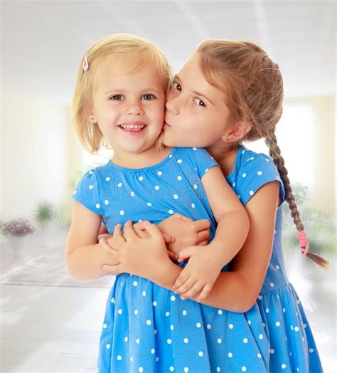 Little Sisters Kiss Stock Image Image Of Portrait Sweet 79981743