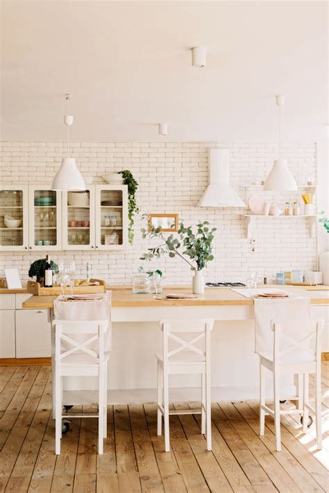 This scandinavian style kitchen shows its signature colors: Modern white kitchen in scandinavian style | Premium Photo