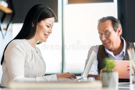 Cheerful Confident Employees Laboring In Office With Joy Stock Image