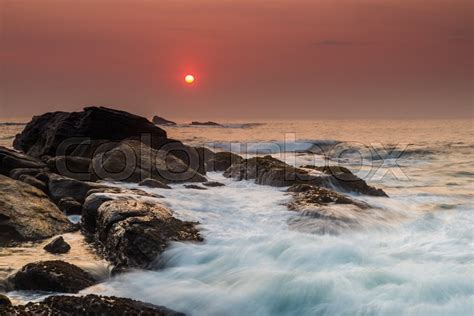 Stormy Sunset On The Shore Of A Stock Image Colourbox