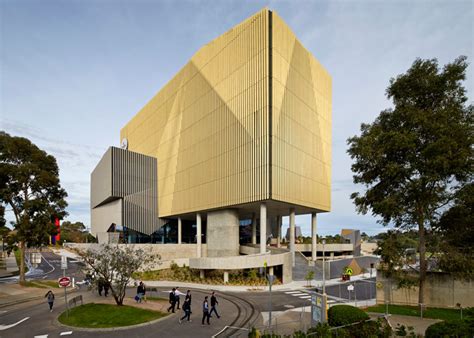 Woods Bagot Adds Elevated Golden Tower To University