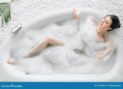 Attractive Lady Lying In Bath With Foam Top View Stock Photo Image