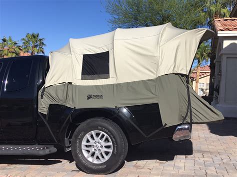 If the truck also comes while these directions are for truck tents that fit in the bed, the instructions are basically the same for the other models. Kodiak Canvas Truck Tent Mid-Sized 5.5' -6' Bed