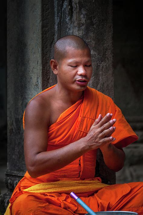 Buddhist Monk Praying Photograph By Art Phaneuf Pixels