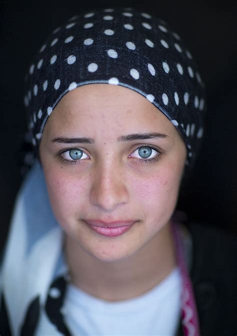 Close Up Of A Young Syrian Refugee Face With Blue Eyes Erbil