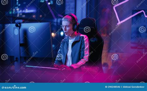Attractive Female Gamer Playing Online Video Game On Computer Portrait