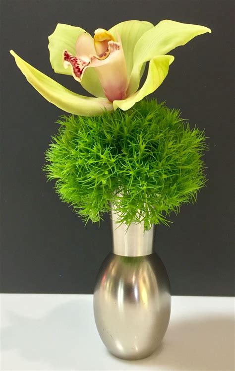 Minimalist Beauty Cymbidium Orchid And Green Trick On Chrome Indian Mini Vase Original Design