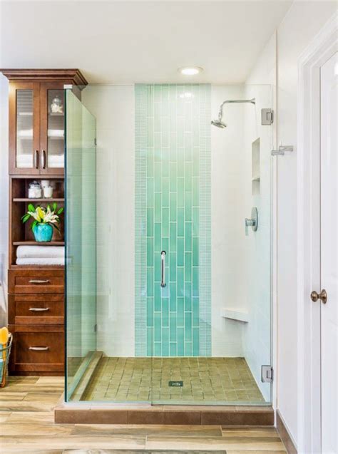 Waterfall Tile Design With Linen Closet Beside Shower Bathroom