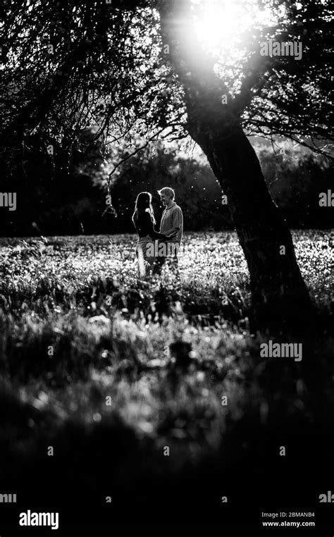 Black And White Photo Man And Woman In Love Together In Sunset Light
