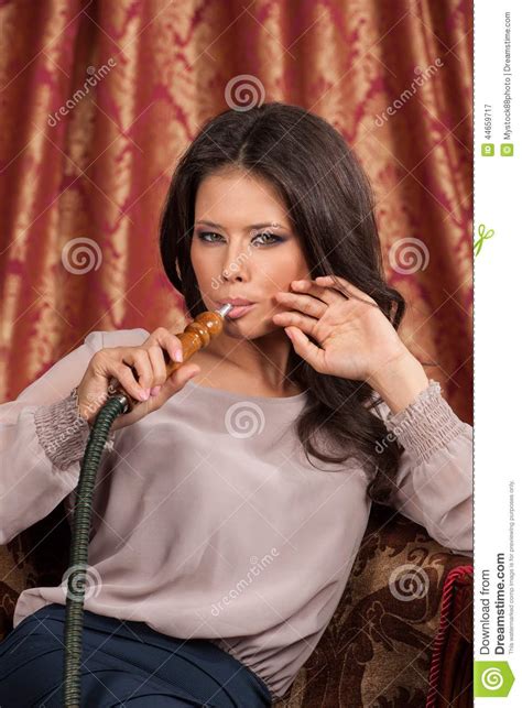 girl smoking turkish shisha in cafe stock image image of beautiful inhaling 44659717