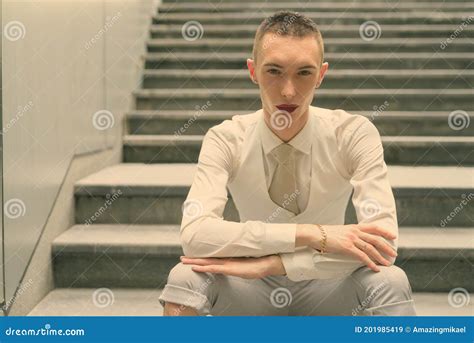 Young Handsome Androgynous Businessman Exploring The City Of Bangkok