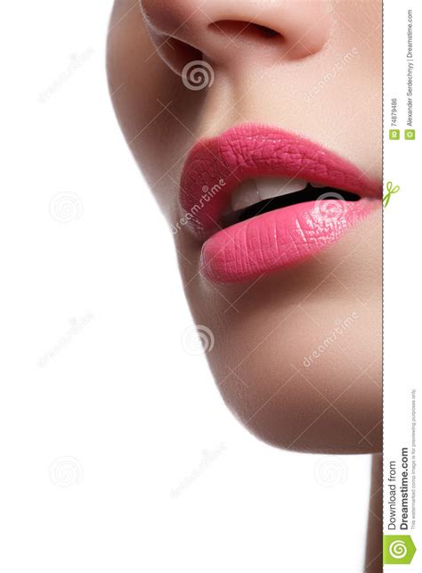 Close Up Of Woman`s Lips With Bright Fashion Pink Glossy Makeup Stock