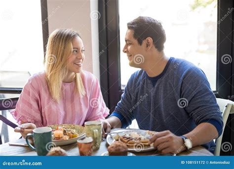Beautiful Young Couple On Date At Restaurant Stock Photo Image Of