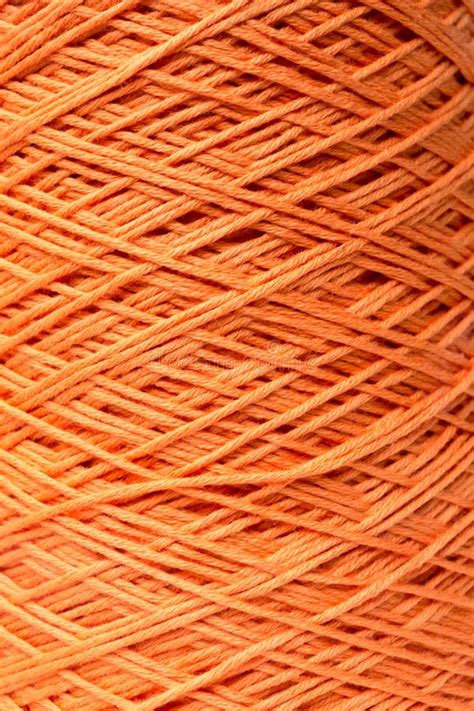 Orange Thread Through Eye Of Needle Stock Photo Image Of Sewing