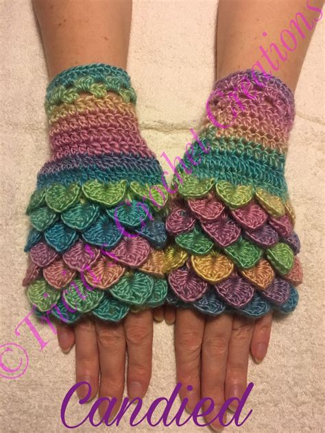 Crochet crocodile stitch is a fun textured stitch that may crocheters love to stitch for cold weathers, boots, scarves, shawls and hats, using the scale looks for animals like these dragon scale or dragon tears fingerless gloves our crochet channel is going to share today in addition to crochet. These beautifully colorful wrist-length dragon scale ...