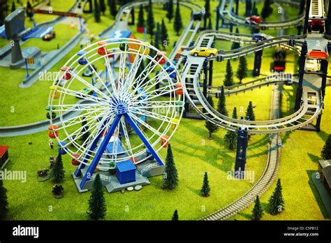 Miniature Model A Park With A Ferris Wheel And The Railway Stock